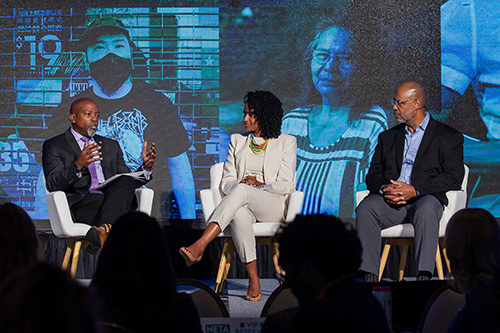 Shawn Turner, Dr. Brook Dennard Rosser, and Juan Johnson on stage for a panel discussion on DEI at the 2023 NETA Conference 