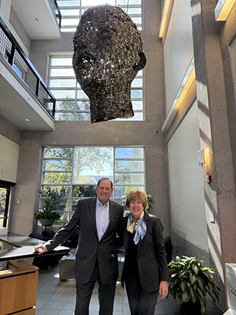 NETA Consultants Tom Rieland & Linda O'Bryon in the lobby of Houston Public Media