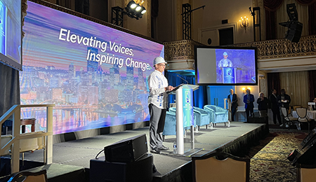 Robert Clauser on stage at the 2024 NETA Conference